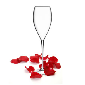 The Magnifico champagne flute by Libbey with rose petals.